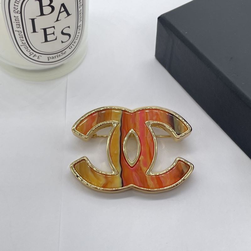 Ch*el brooches